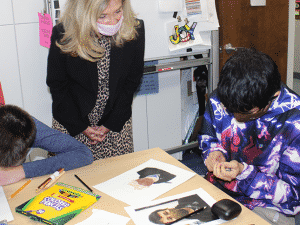 Marcella Franczkowski helps a student learn